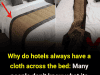 Why Do Hotels Always Have That Cloth at the Foot of the Bed? Here’s the Real Purpose